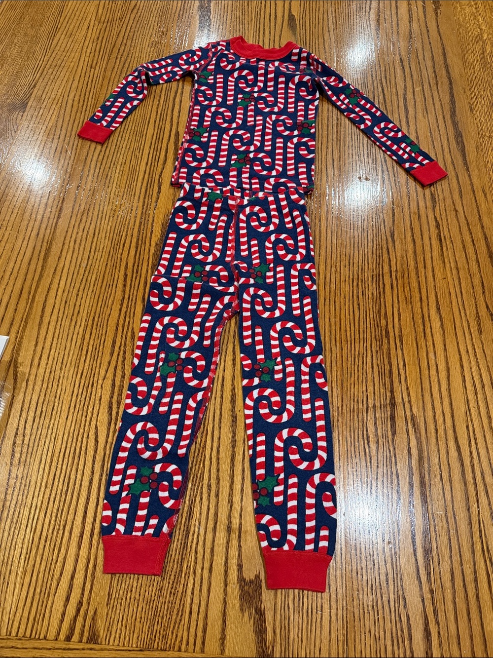 Hanna Andersson Red and Navy Candy Cane Print Kids One-Piece Footie